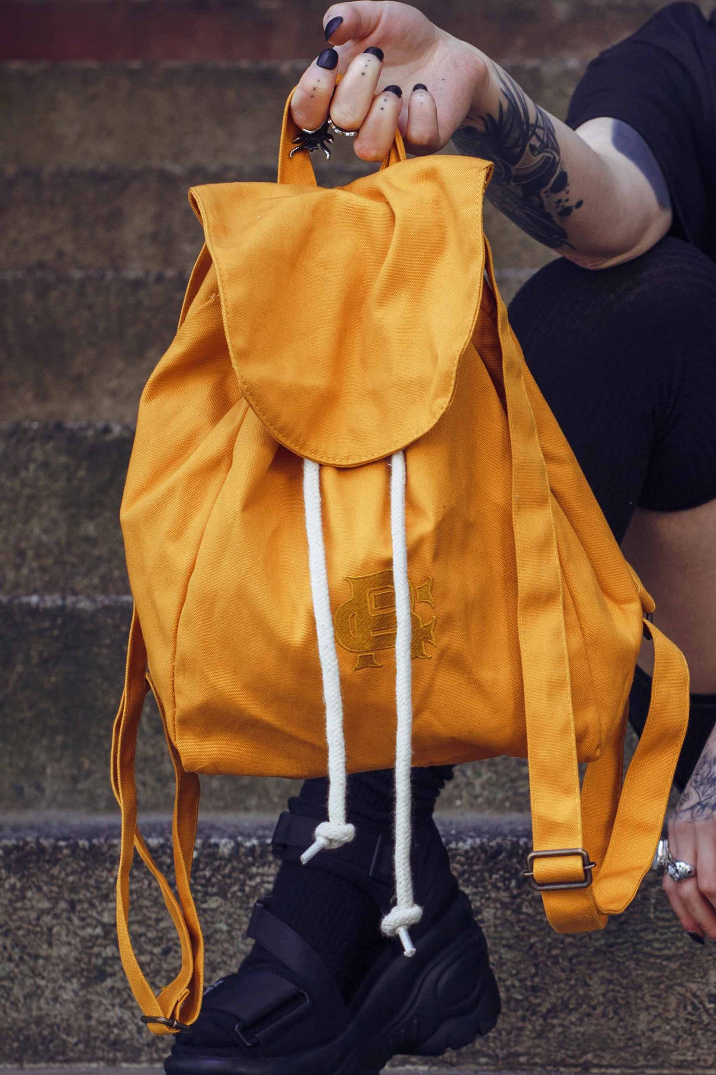 Root Cause Mustard Mini Rucksack