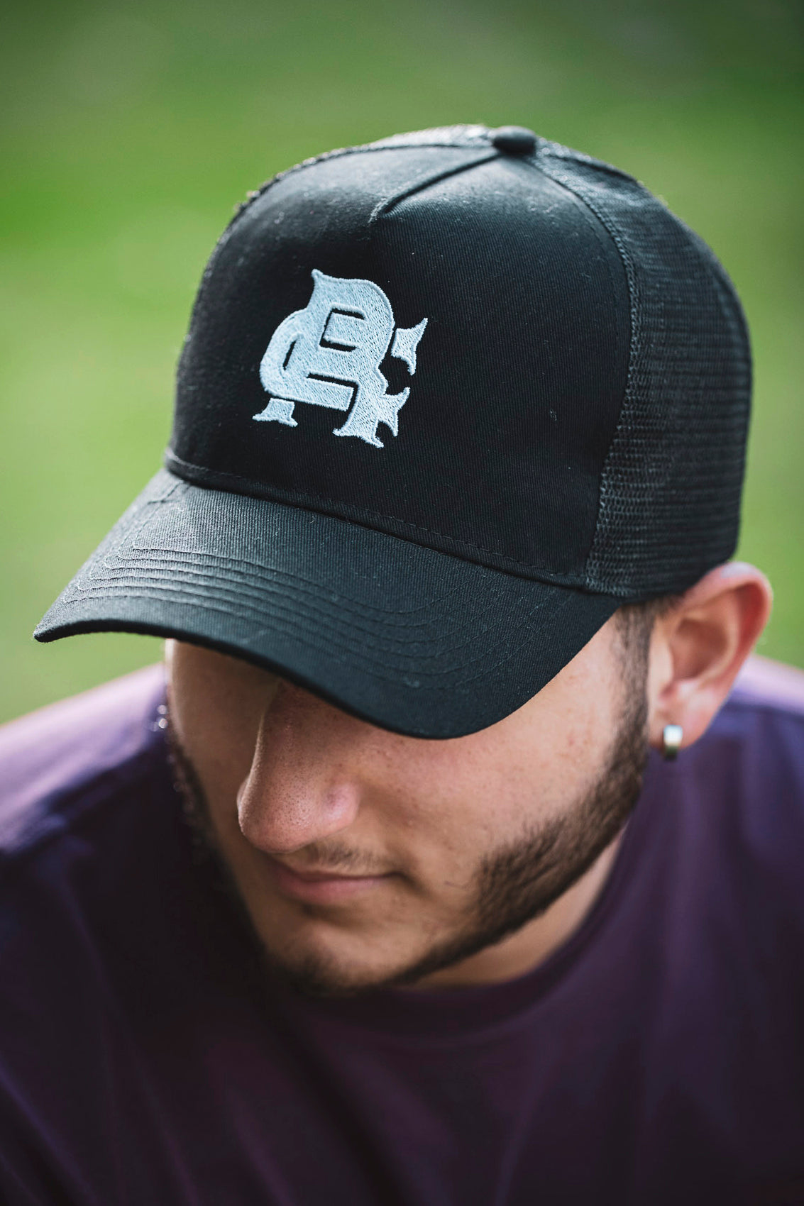 Root Cause Branded Black Trucker Cap