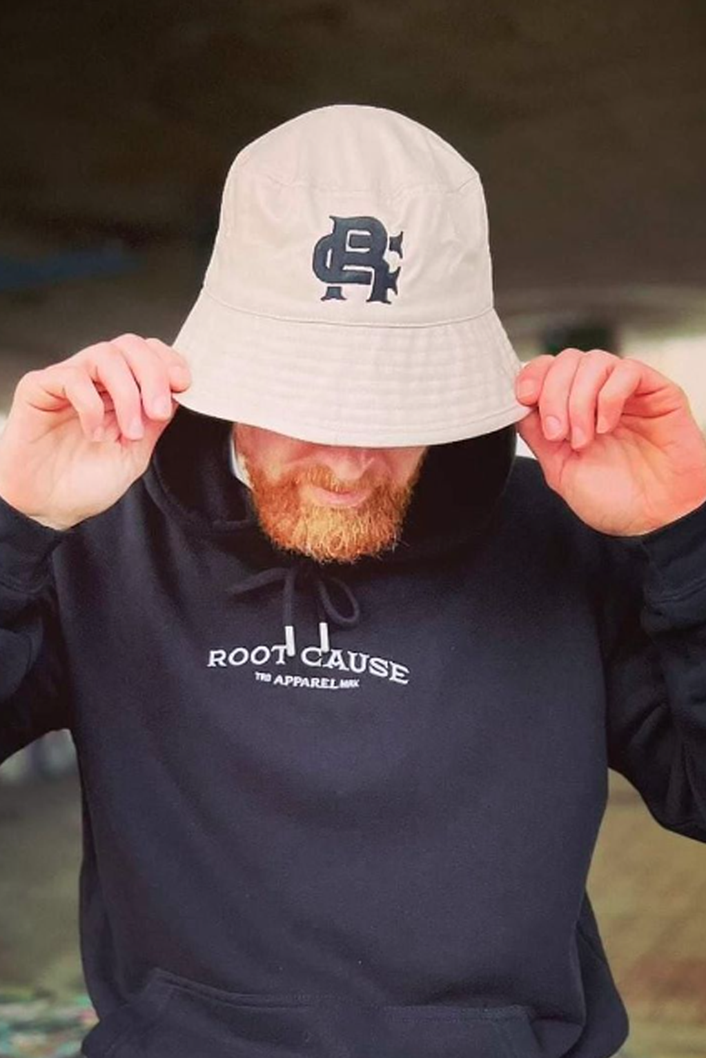 Root Cause Monogram Sand Bucket Hat