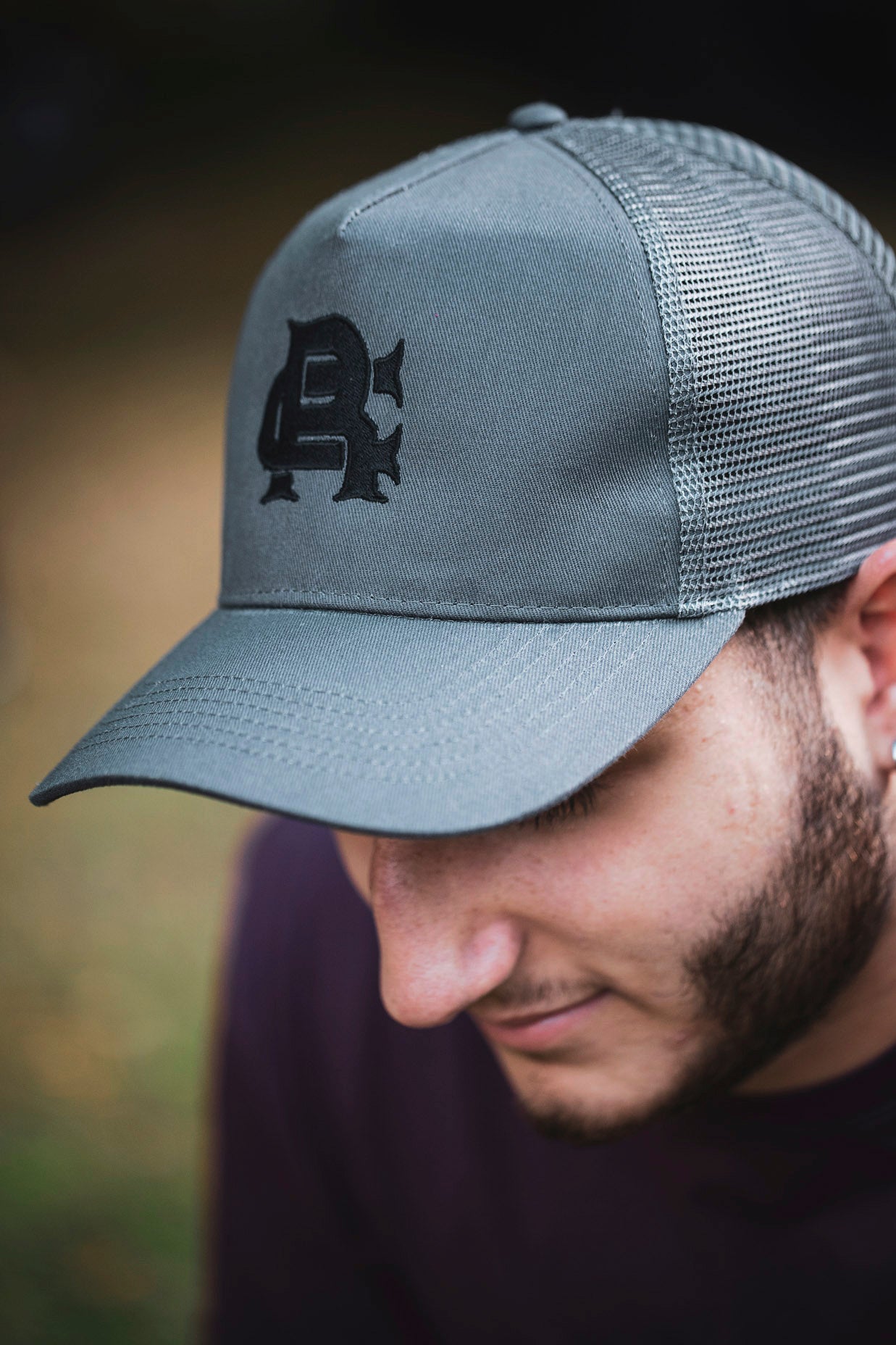 Root Cause Branded Grey Trucker Cap