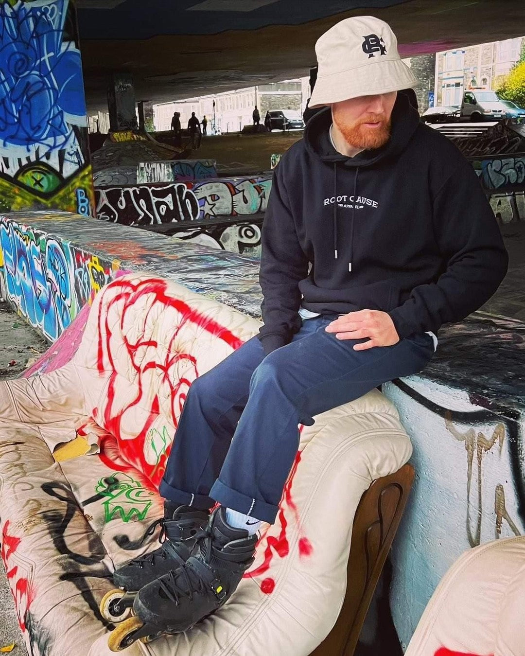 Root Cause Monogram Sand Bucket Hat