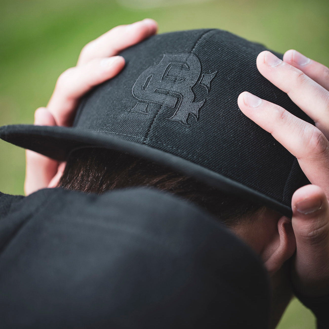 Root Cause Branded Black Snap Back Cap