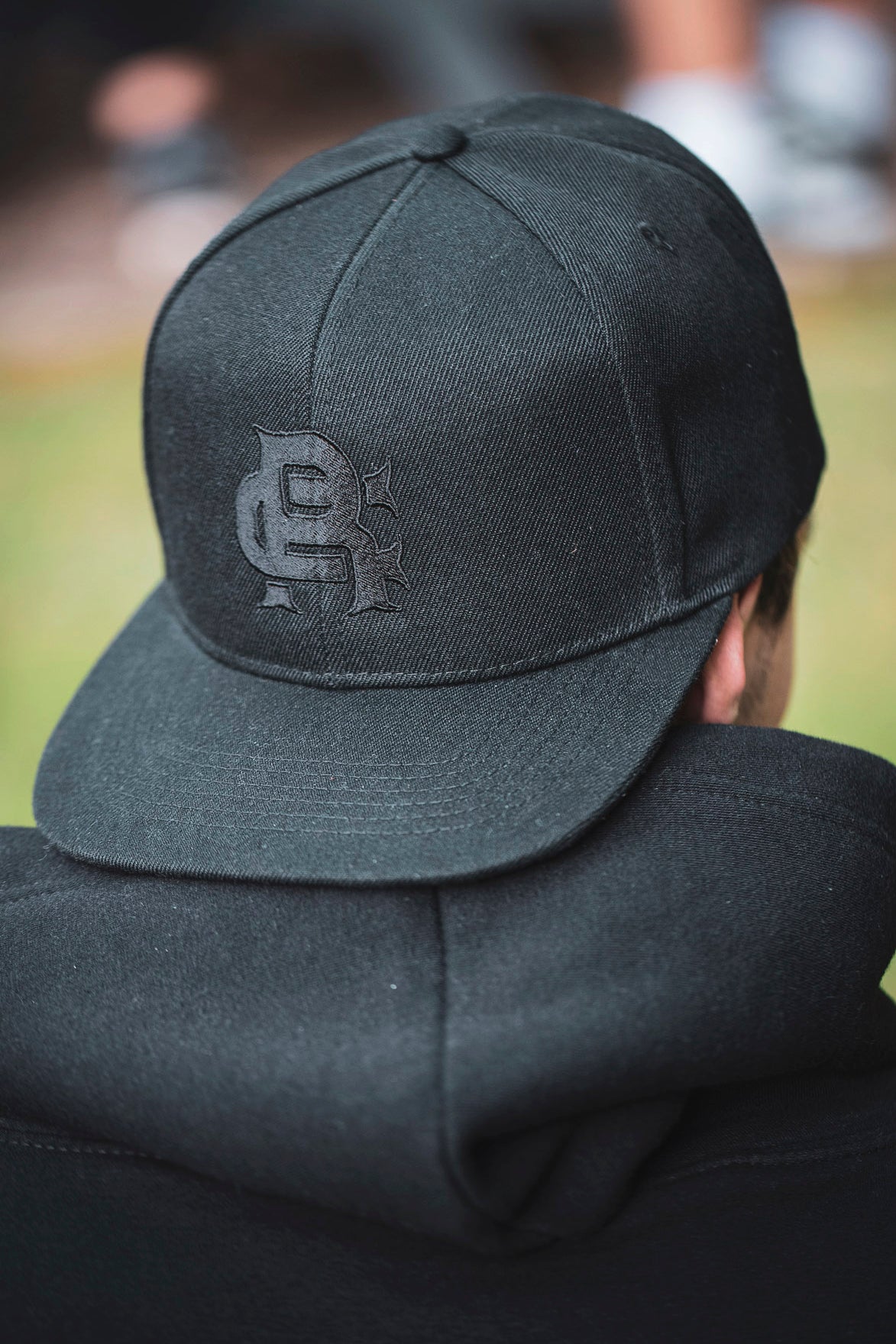 Root Cause Branded Black Snap Back Cap
