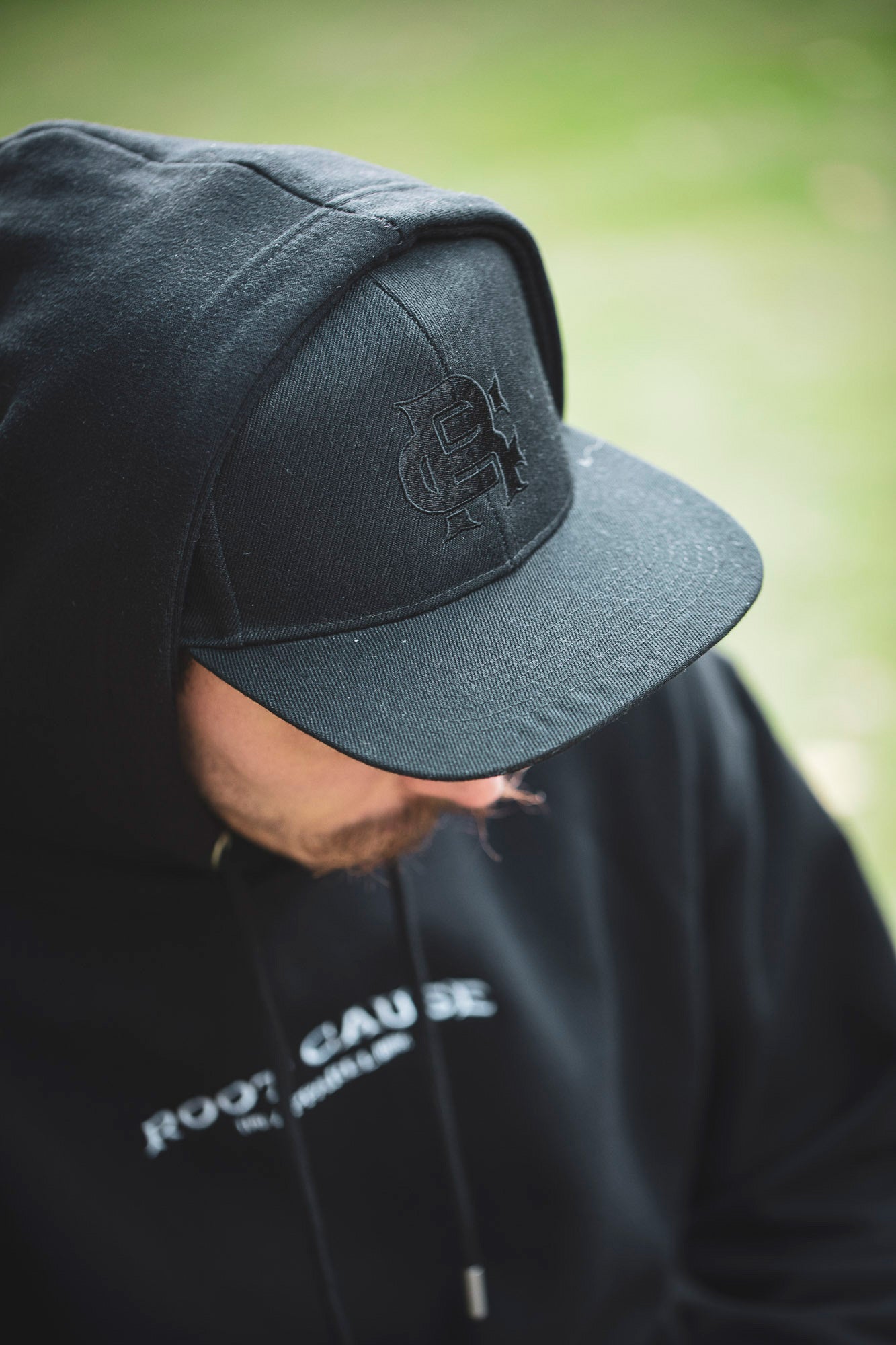 Root Cause Branded Black Snap Back Cap