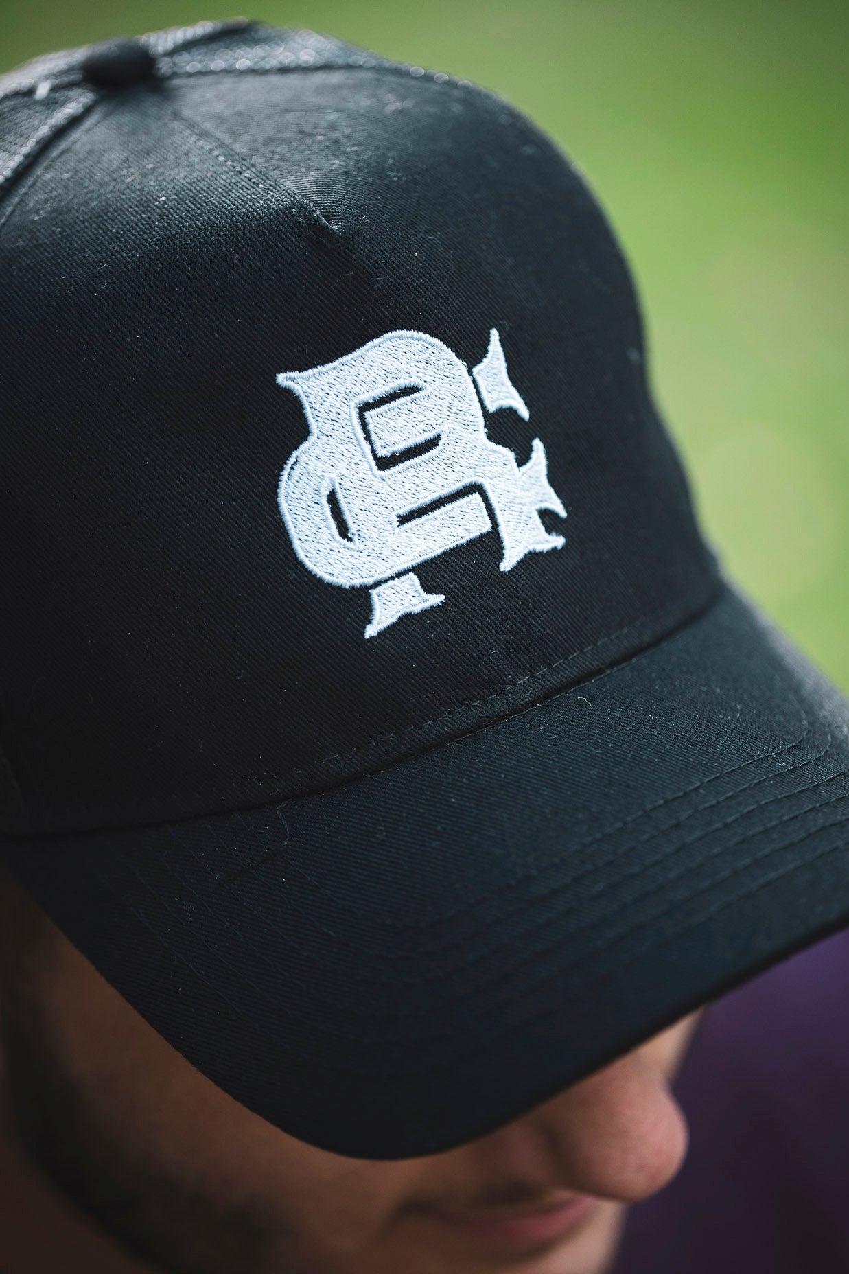 Root Cause Branded Black Trucker Cap