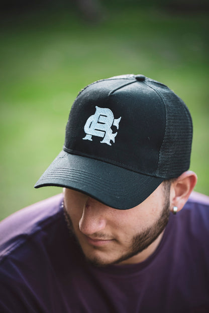 Root Cause Branded Black Trucker Cap