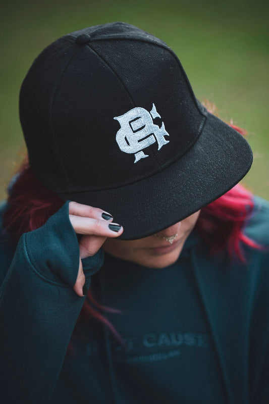 Root Cause Branded White on Black Snapback Cap